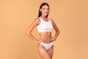 Body,Slimming,Concept.,Happy,Lady,With,Slim,Figure,In,White