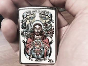 Zippo vžigalnik s podobo Jezusa