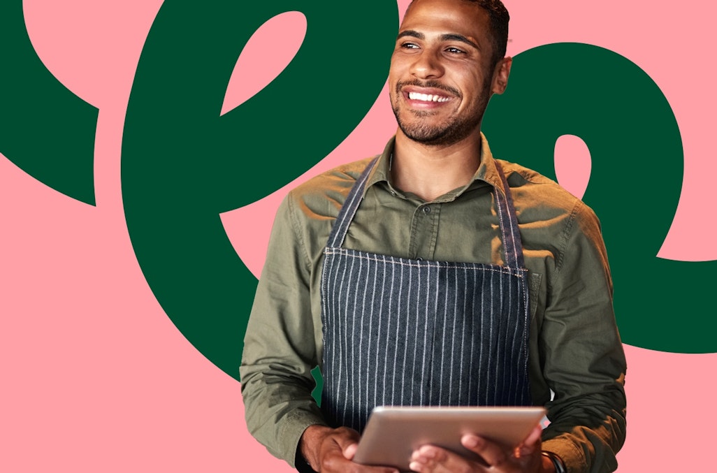 Merchant with tablet improving in-person payment experience