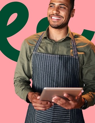 Merchant with tablet improving in-person payment experience