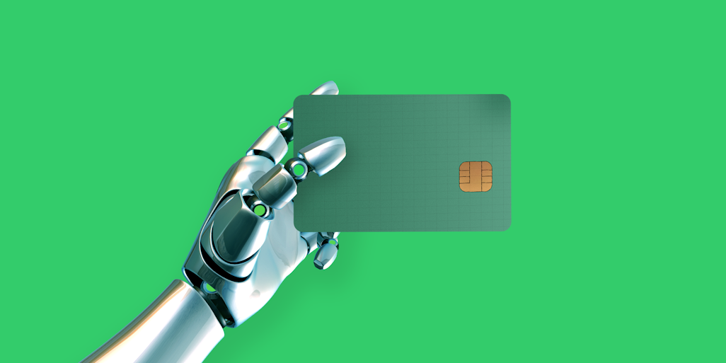 robot hand with payment card