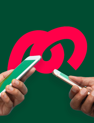 two hands holding iphones