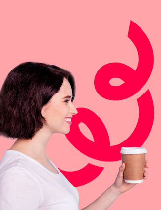 woman holding coffee cup