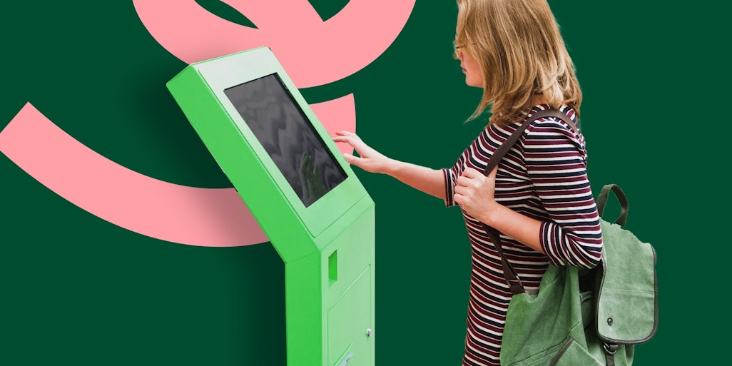 Unattende payments | Woman touching self service kiosk
