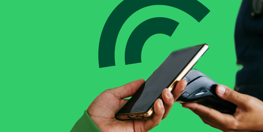 Barista receiving in-person payment from mobile phone using SmartPOS