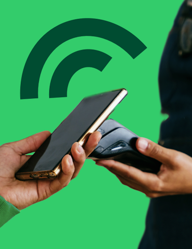 Barista receiving in-person payment from mobile phone using SmartPOS