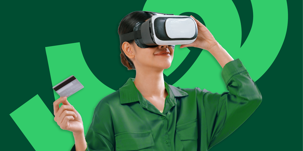 augmented reality, woman holding credit card, vr glasses