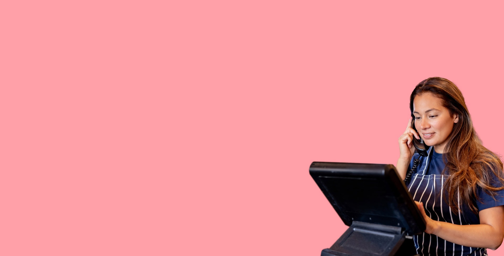 Waitress using EPOS powered by Aevi