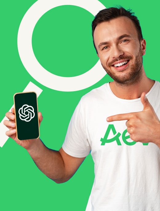 Man with phone showing Chat-GPT logo