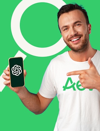 Man with phone showing Chat-GPT logo