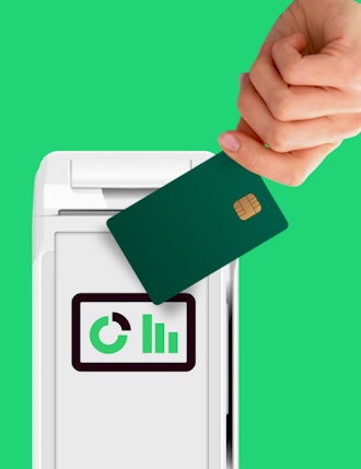 Tapping credit card on POS device with data graph | Levering merchant data