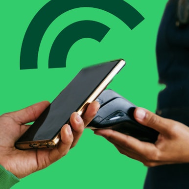Barista receiving in-person payment from mobile phone using SmartPOS
