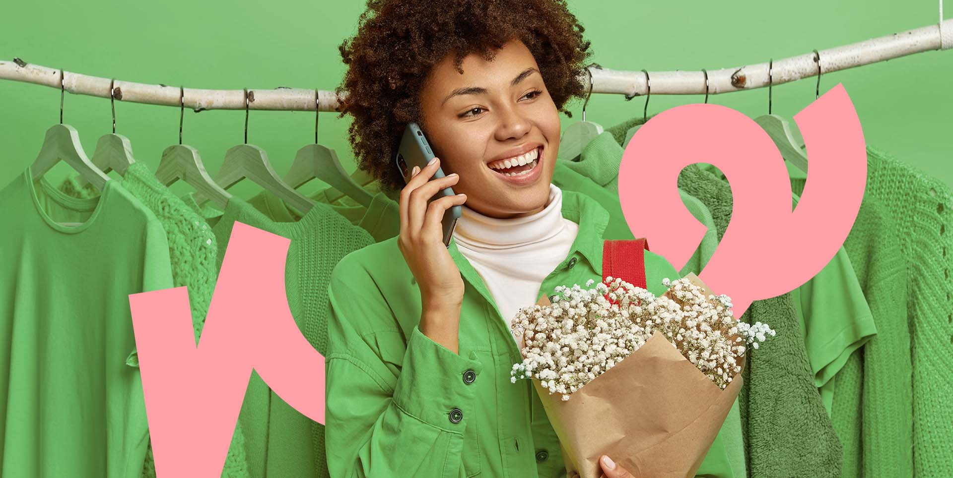 Woman holding phone and flowers
