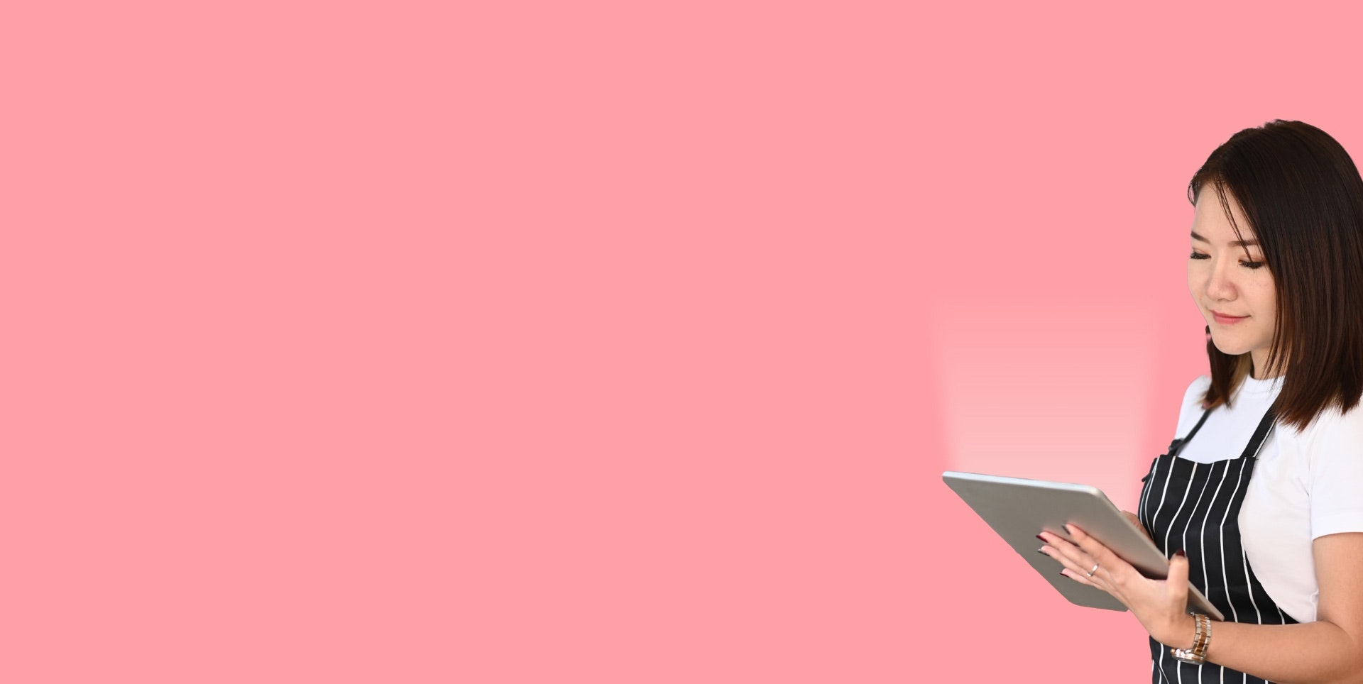 Merchant looking at inventory application by Aevi