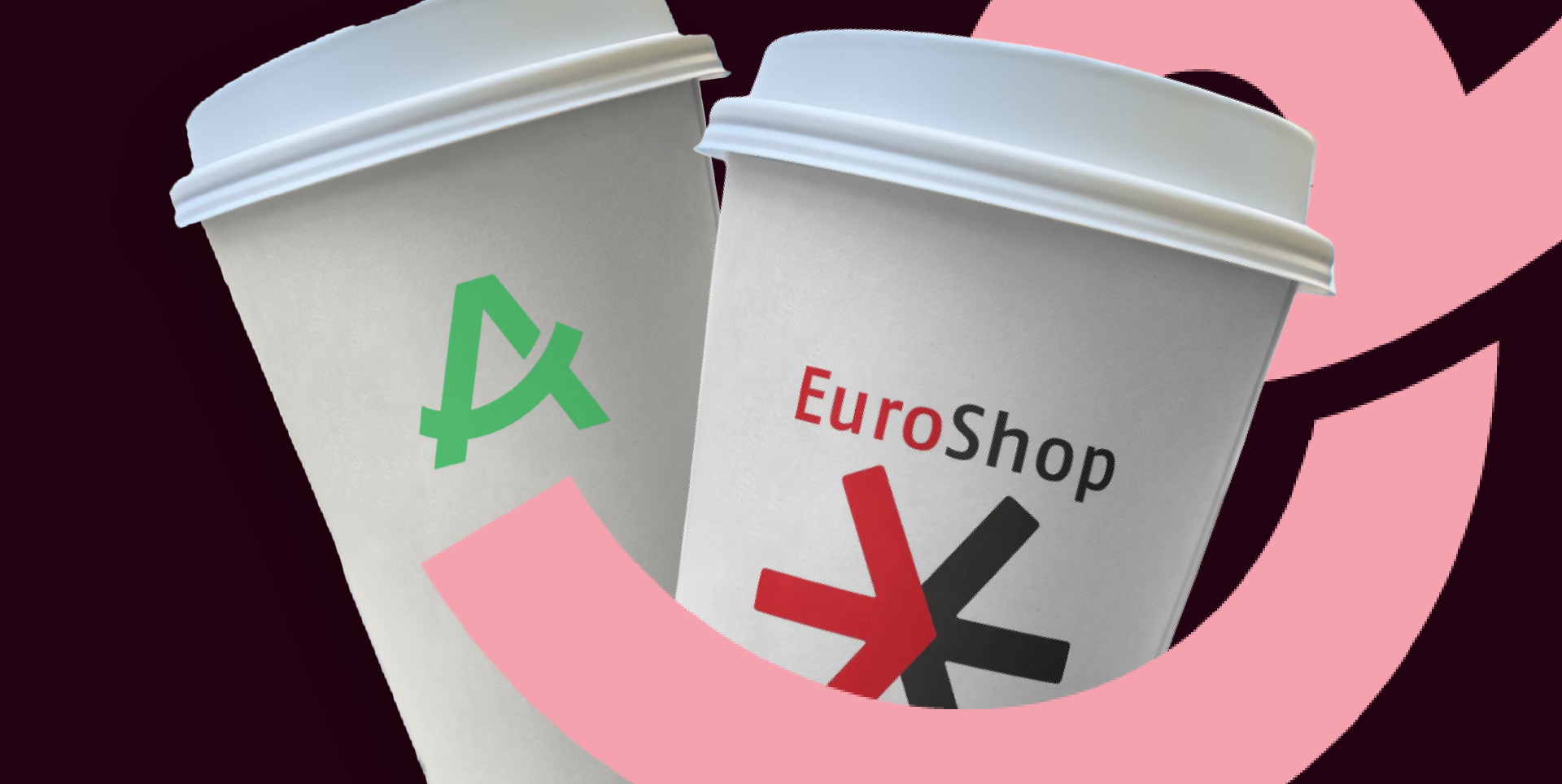 Cup with Aevi logo and cup with EuroSHOP logo next to each other