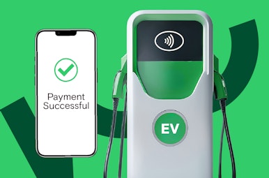 Phone showing successful payment next to an EV charger