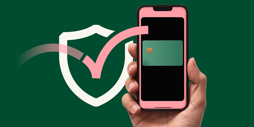 Hand with mobile phone payment with security icon