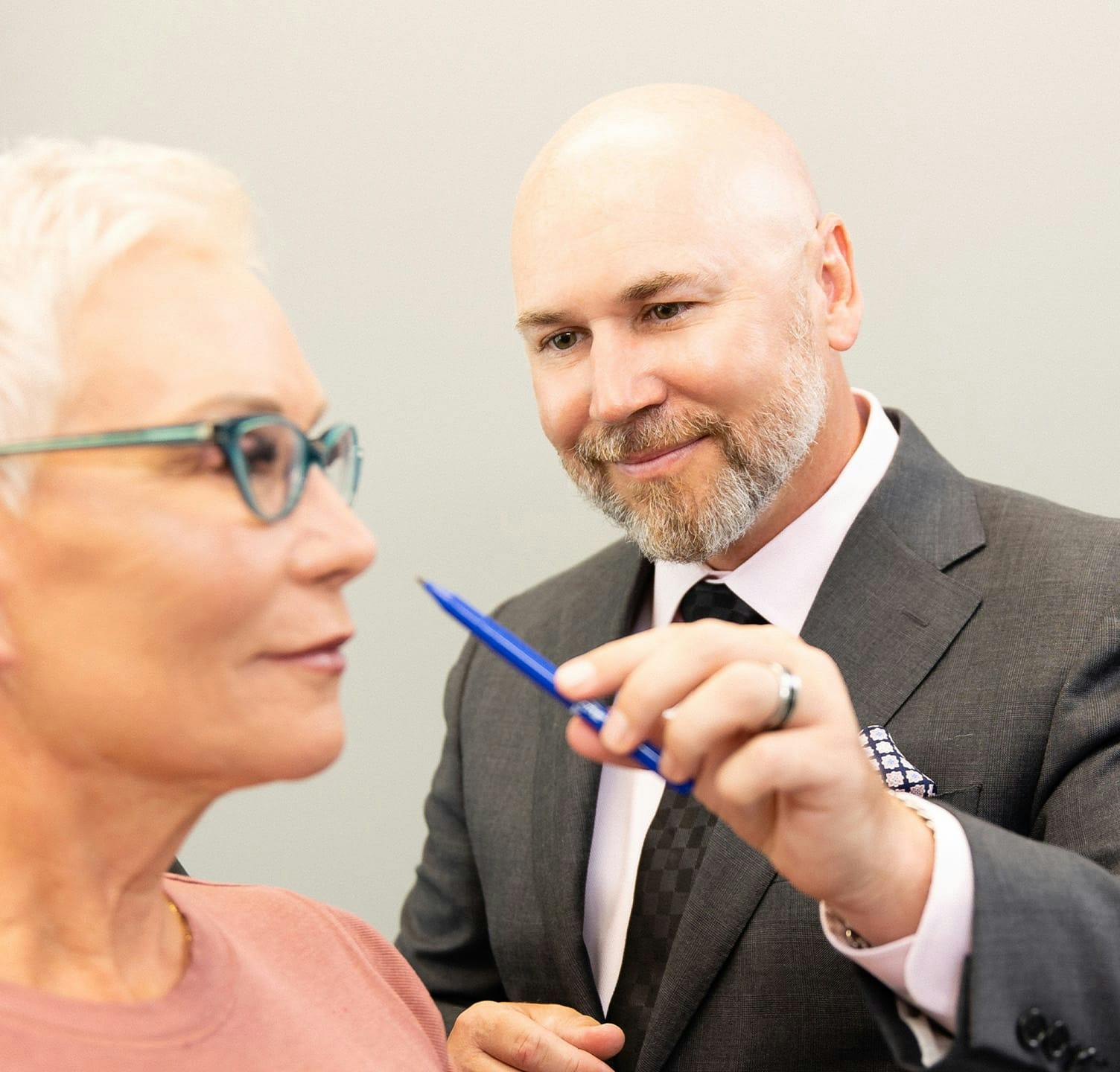 Dr. Warner examining patient's face