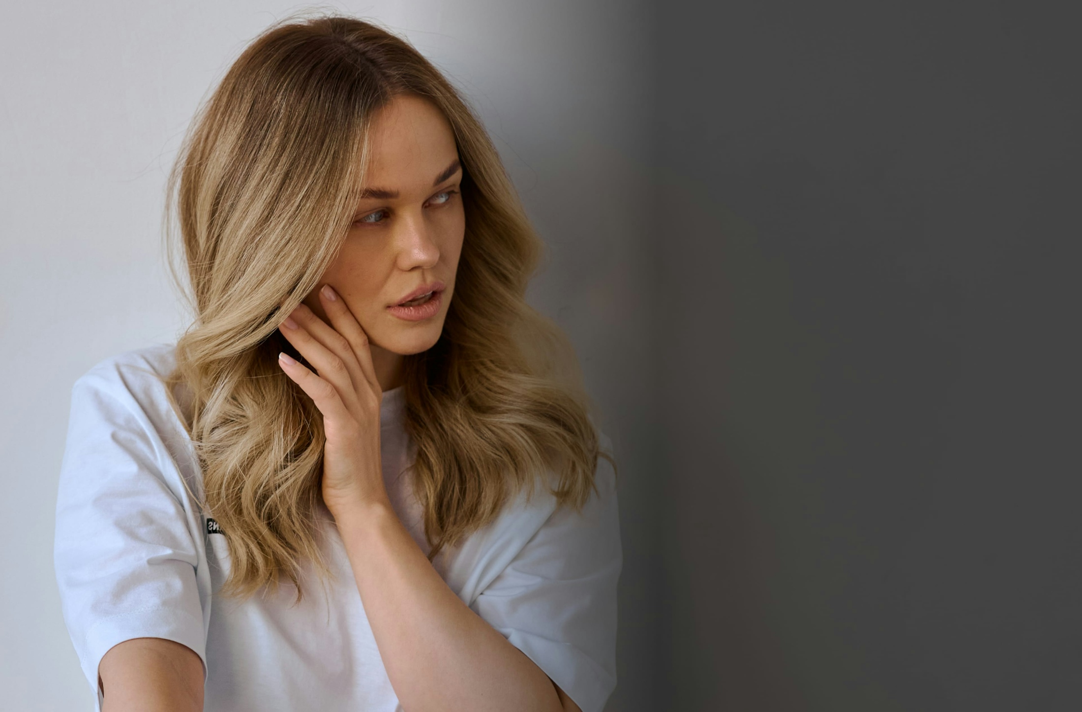 Blond woman in white shirt