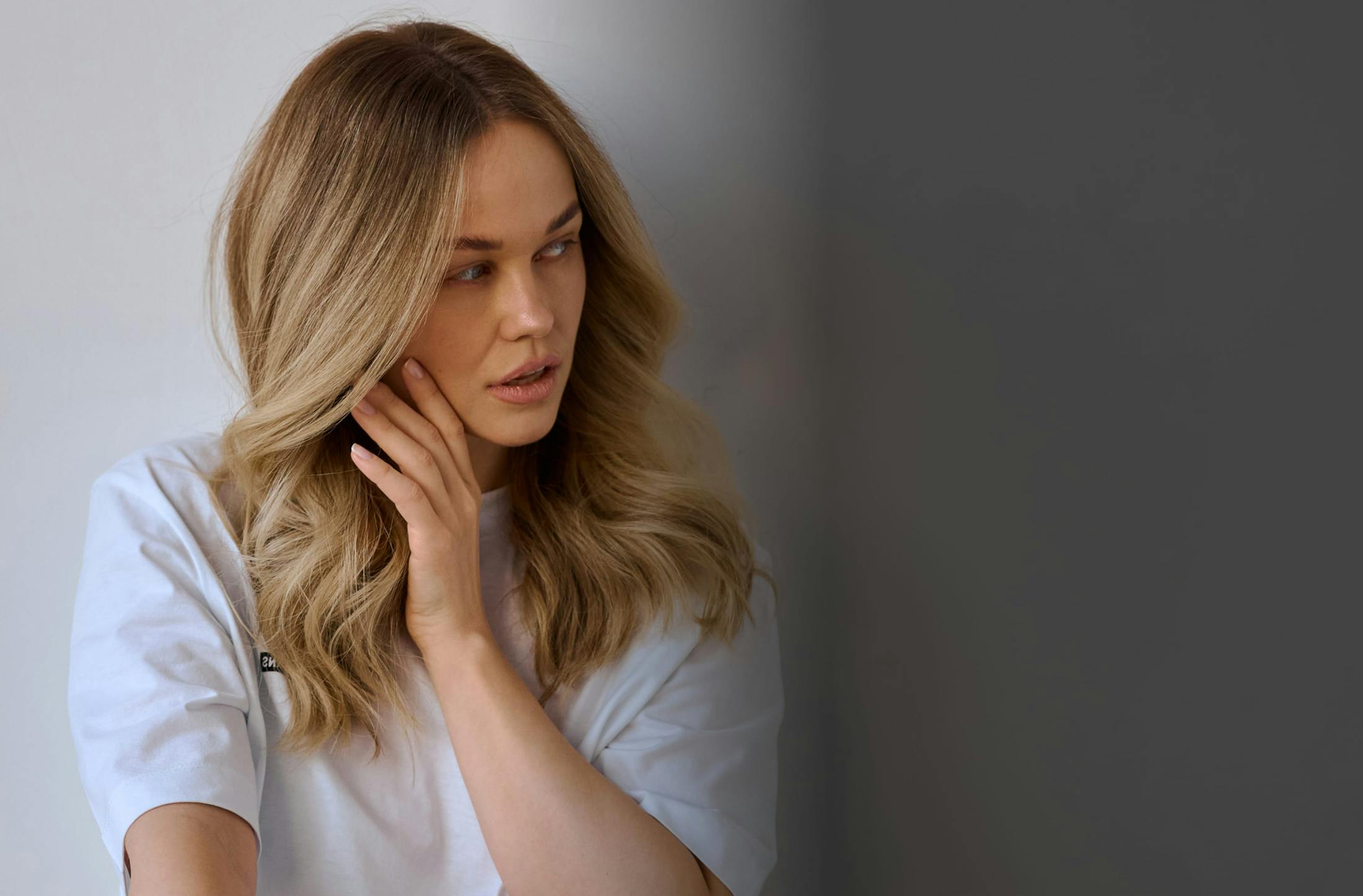 Blond woman in white shirt