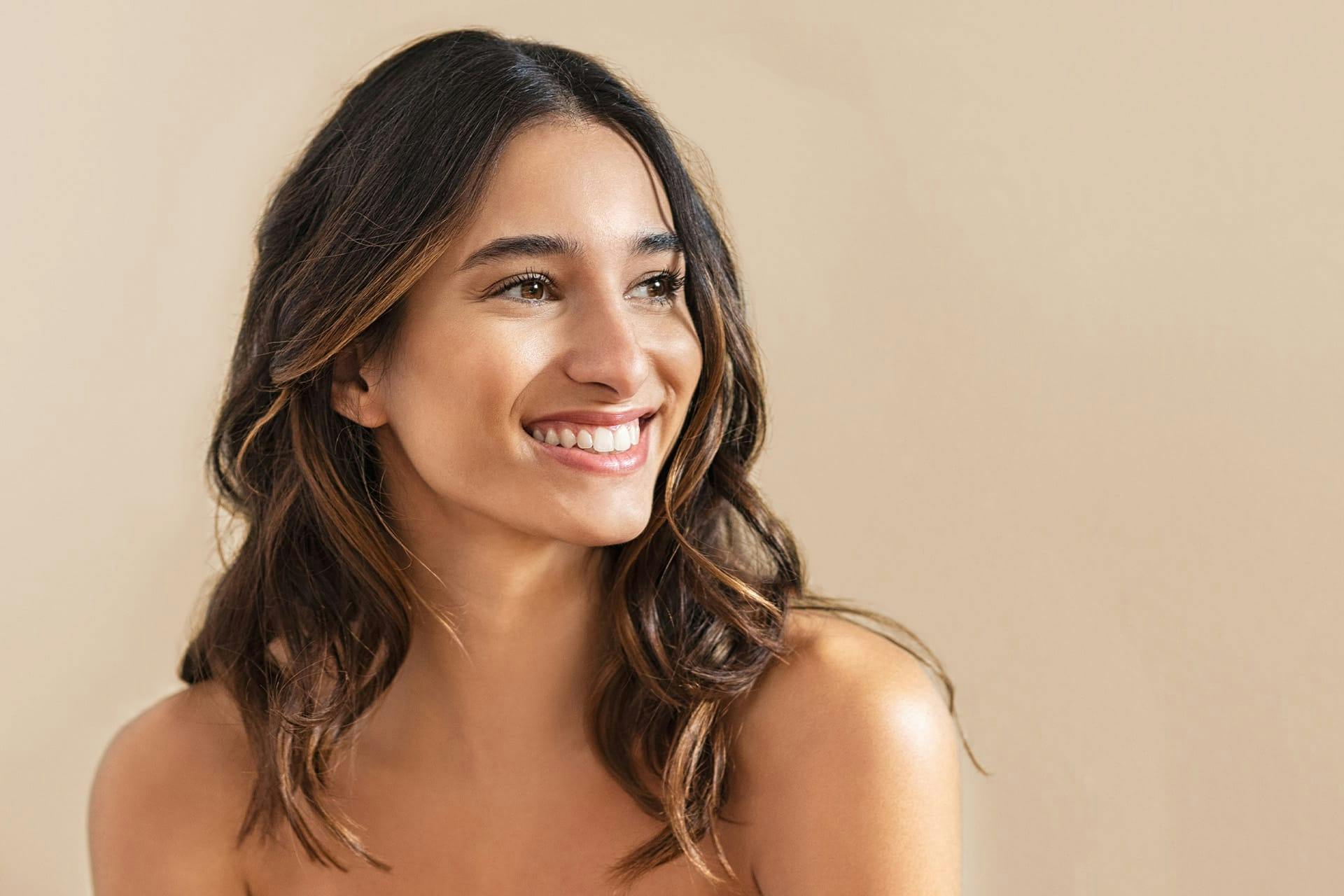 Smiling woman looking to side