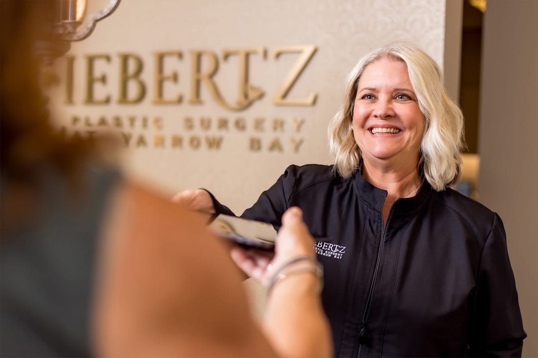 Liebertz Plastic Surgery front desk staff greeting client