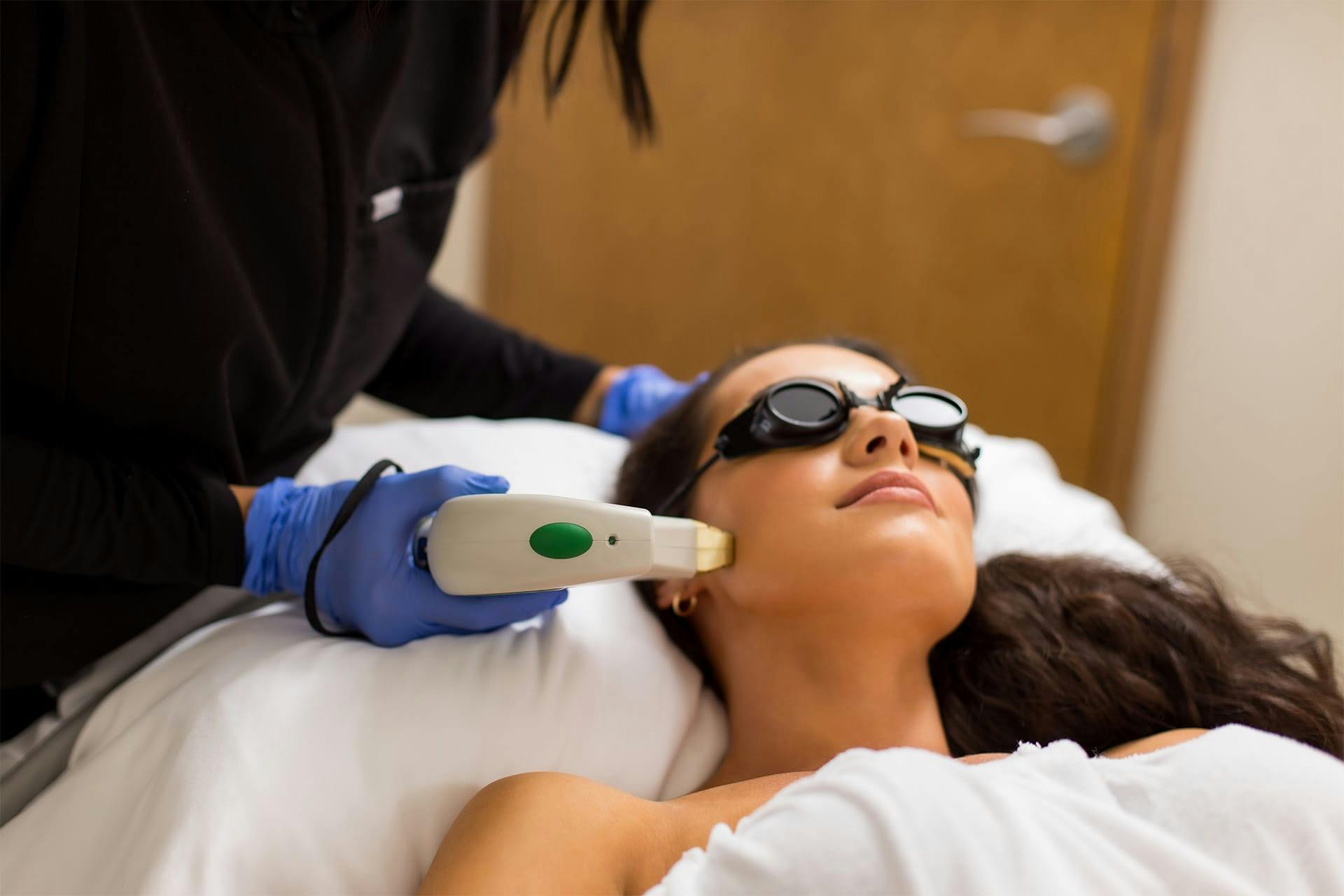 Young woman receiving skin rejunvenation procedure
