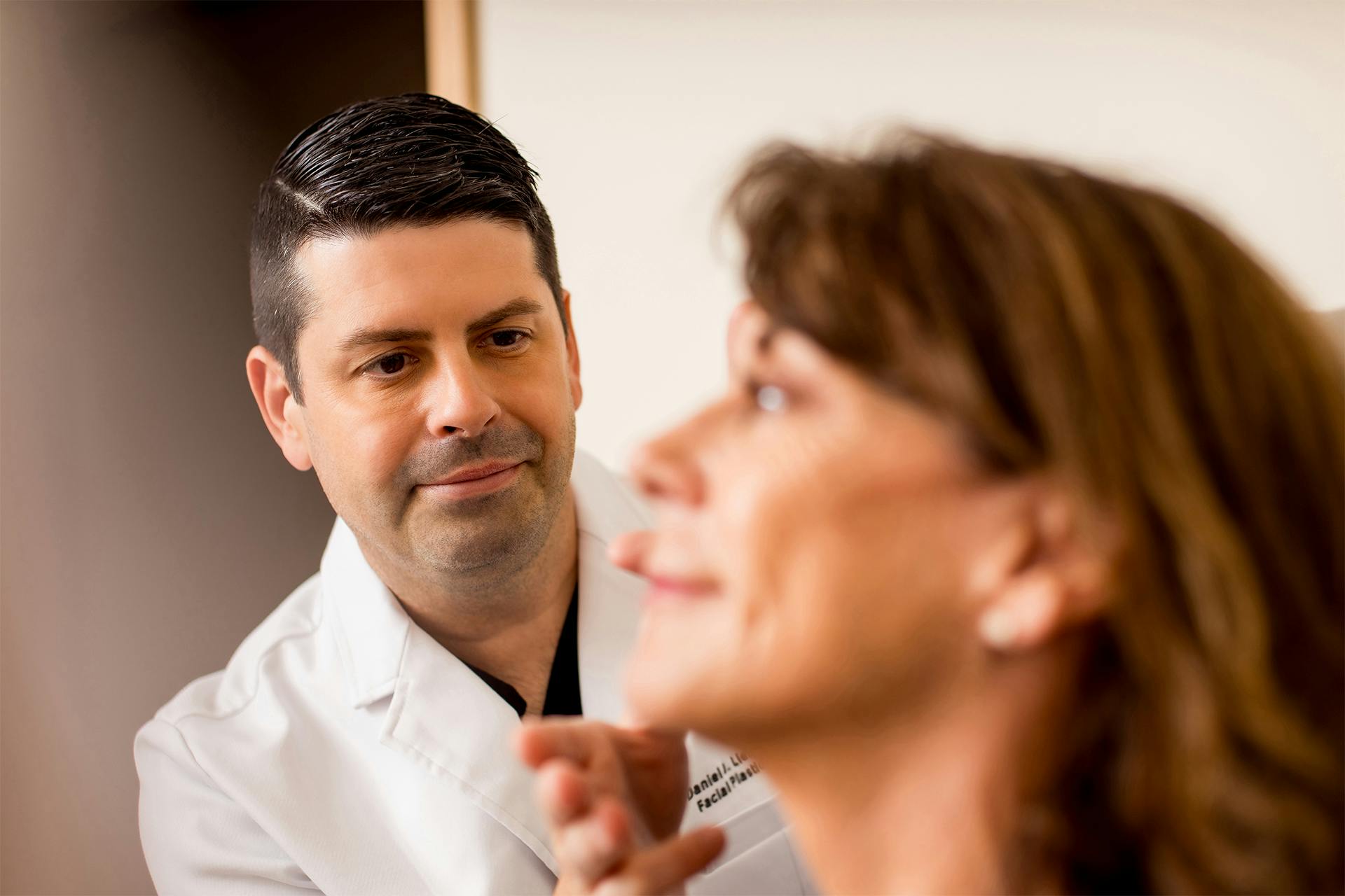 Dr. Daniel Liebertz working with patient