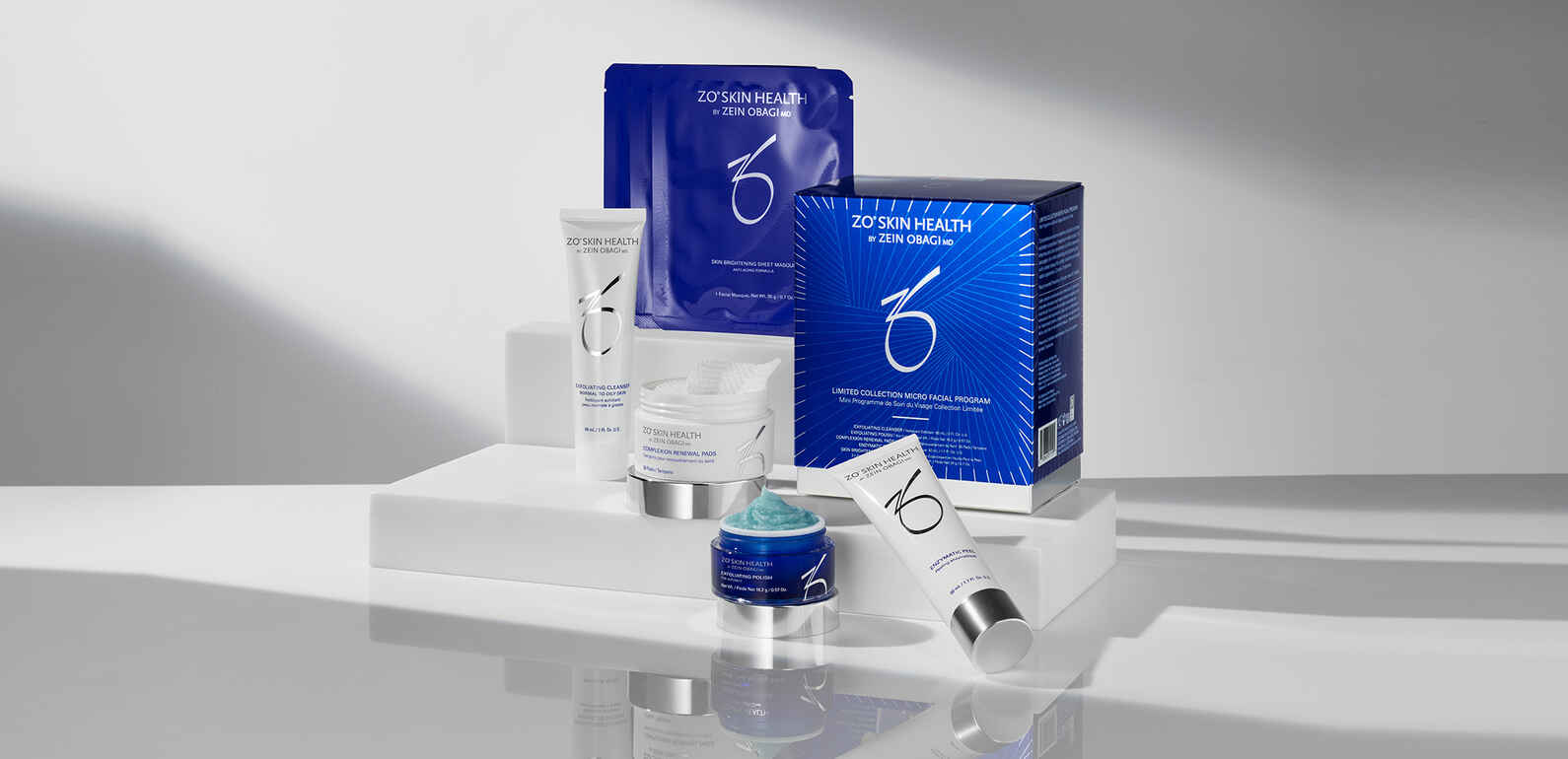 zo skin health product display on a glass table