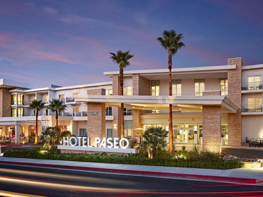 Hotel Paseo exterior at dusk