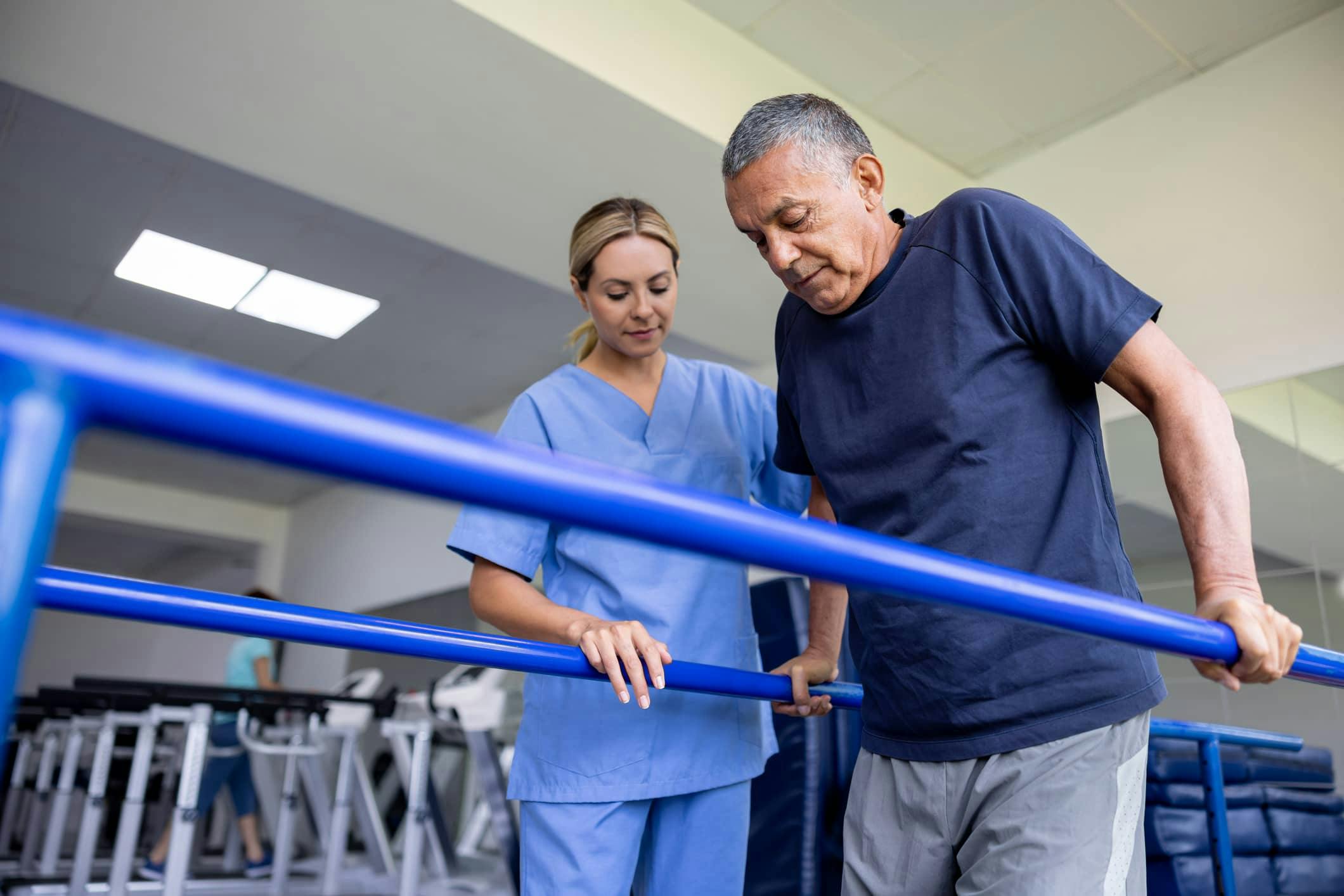 Man going through physical therapy after surgery