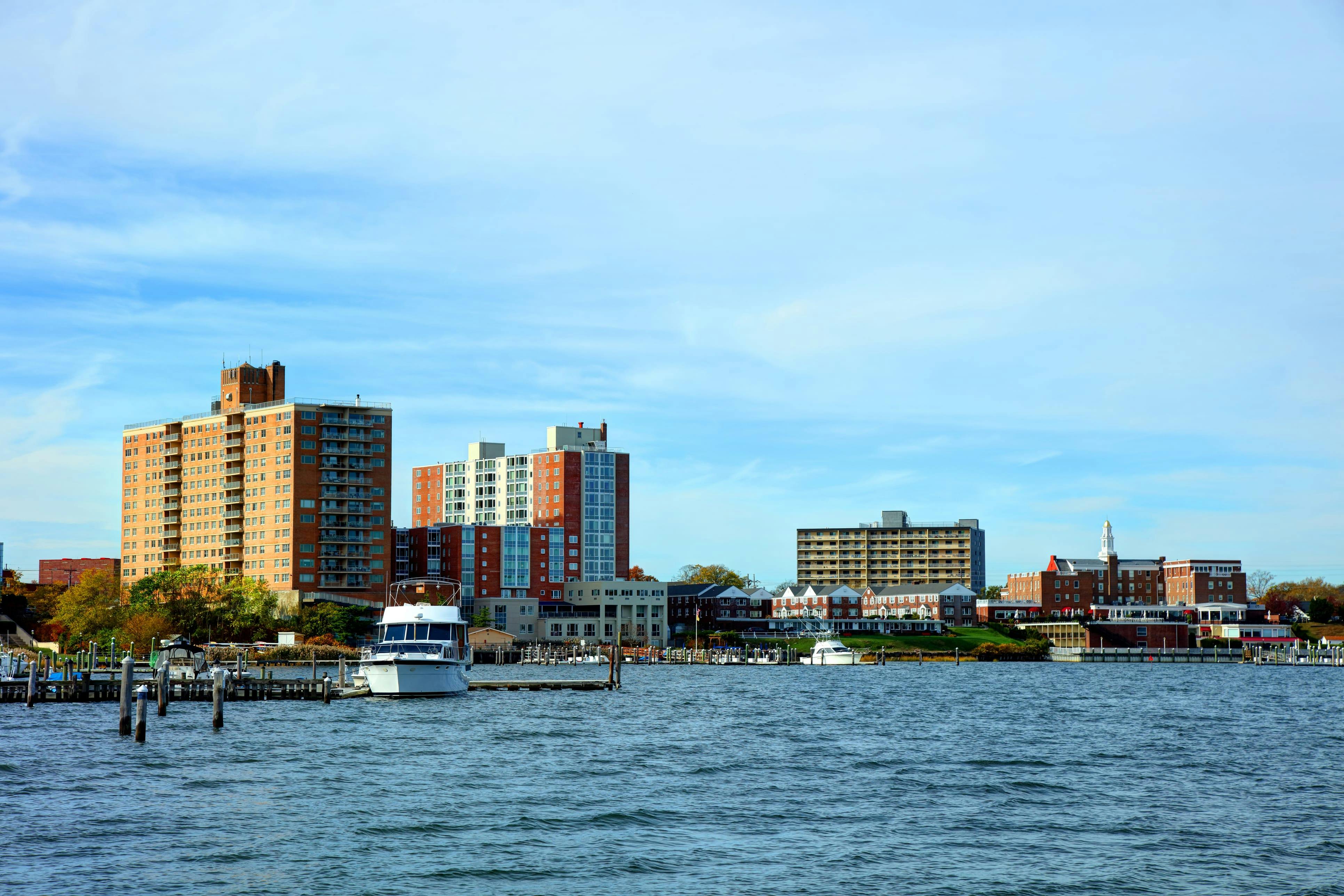 Photo of buildings next to docks and water