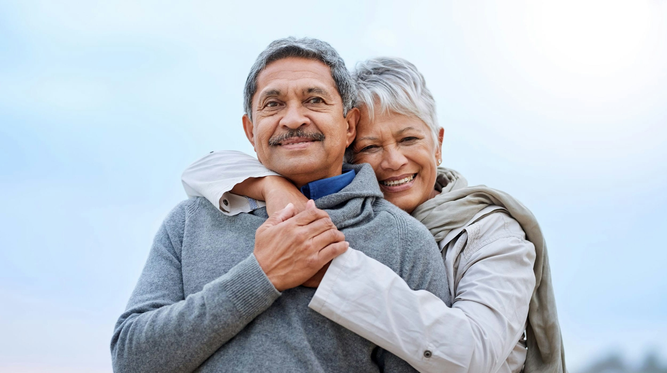 Happy Older couple holding each other