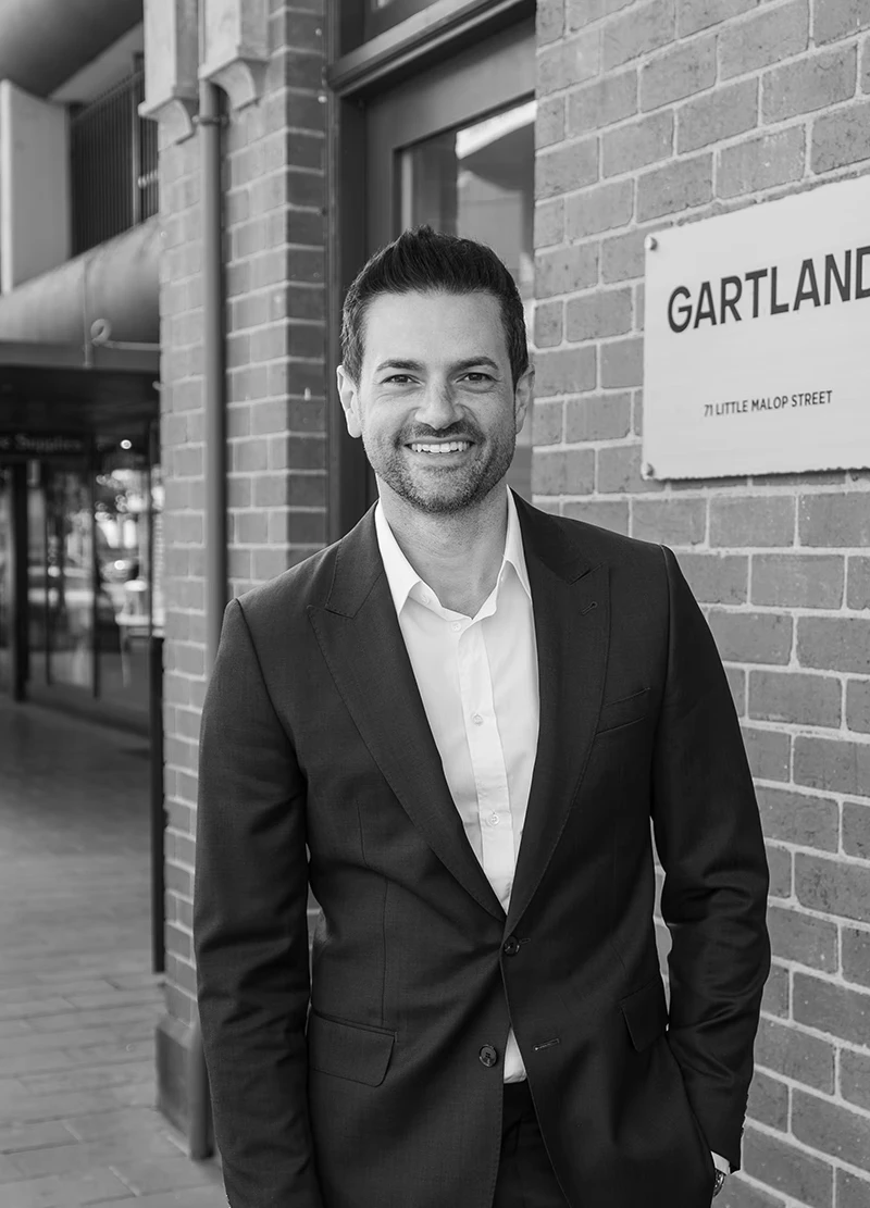 Michael De Stefano, Director at Gartland, professional headshot outside the office