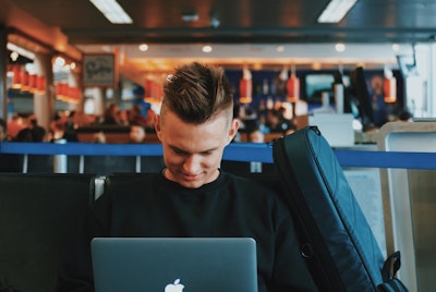 young man working on his laptop