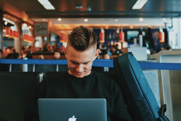 young man working on his laptop