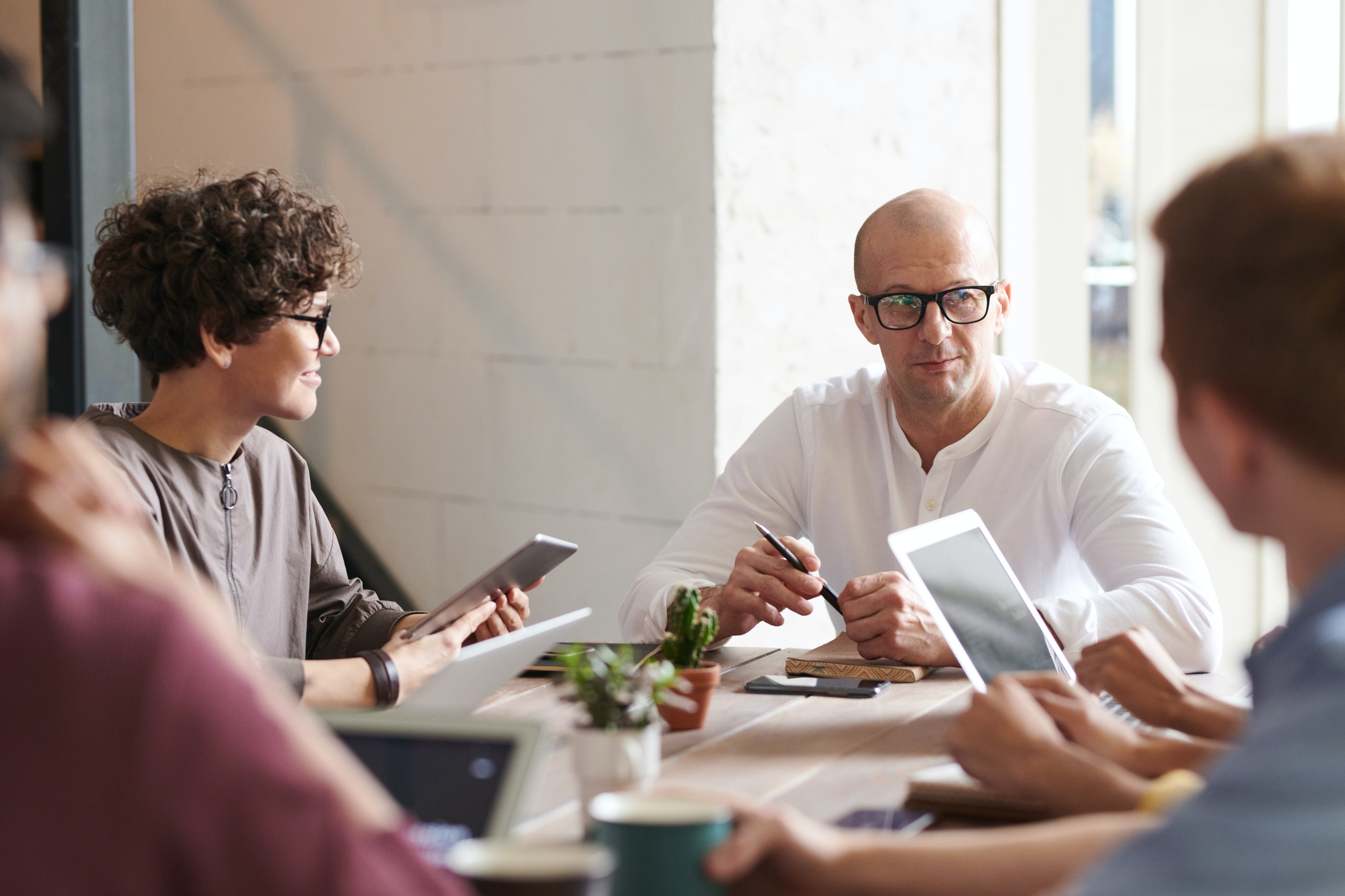 people having a meeting in the office
