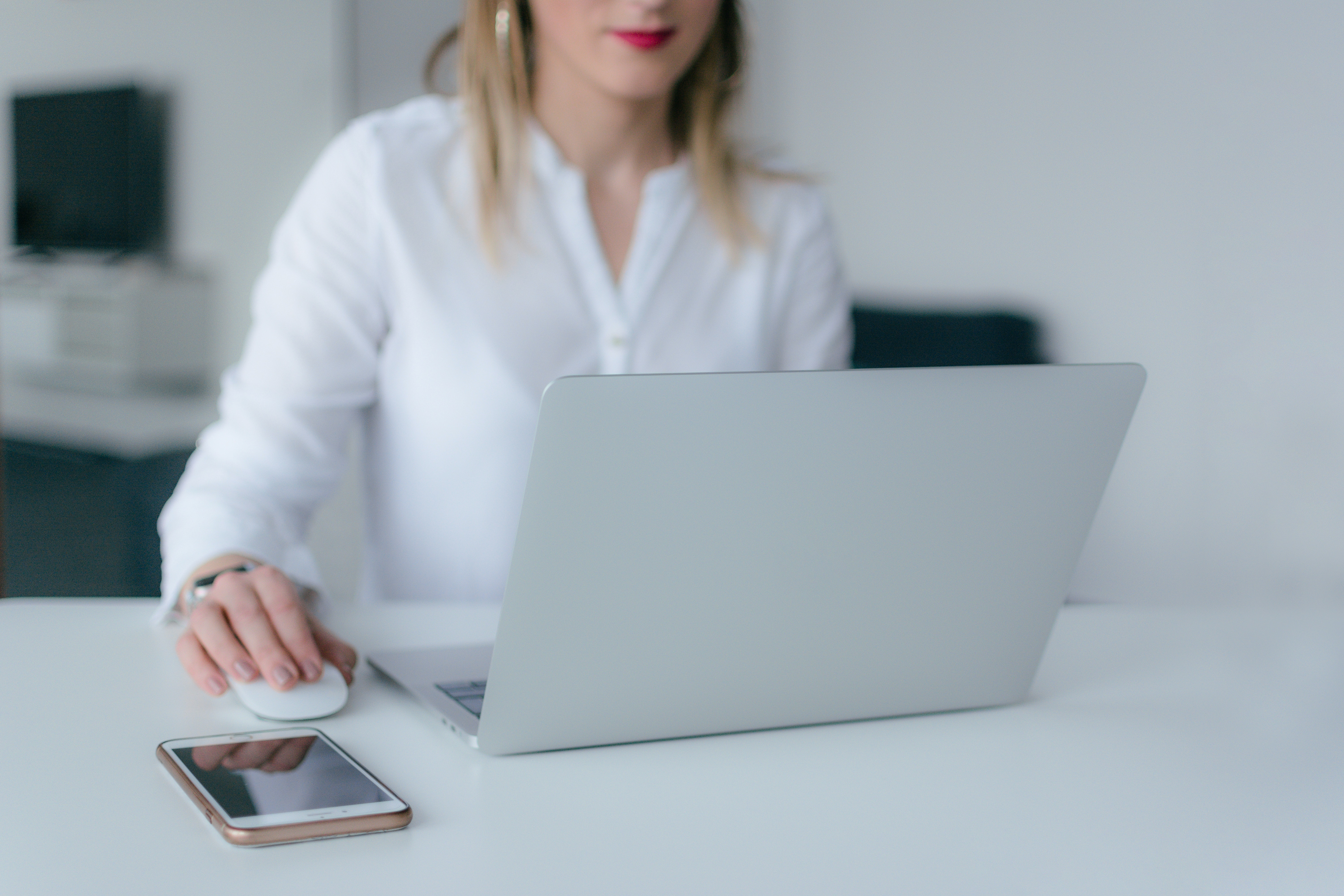 This woman is completing her post-event tasks in order to keep her audience engaged after the virtual event has ended