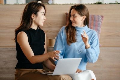Two women participating in virtual workshop