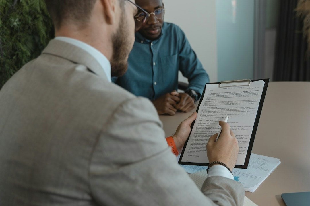 two men in suits building an internal communication plan
