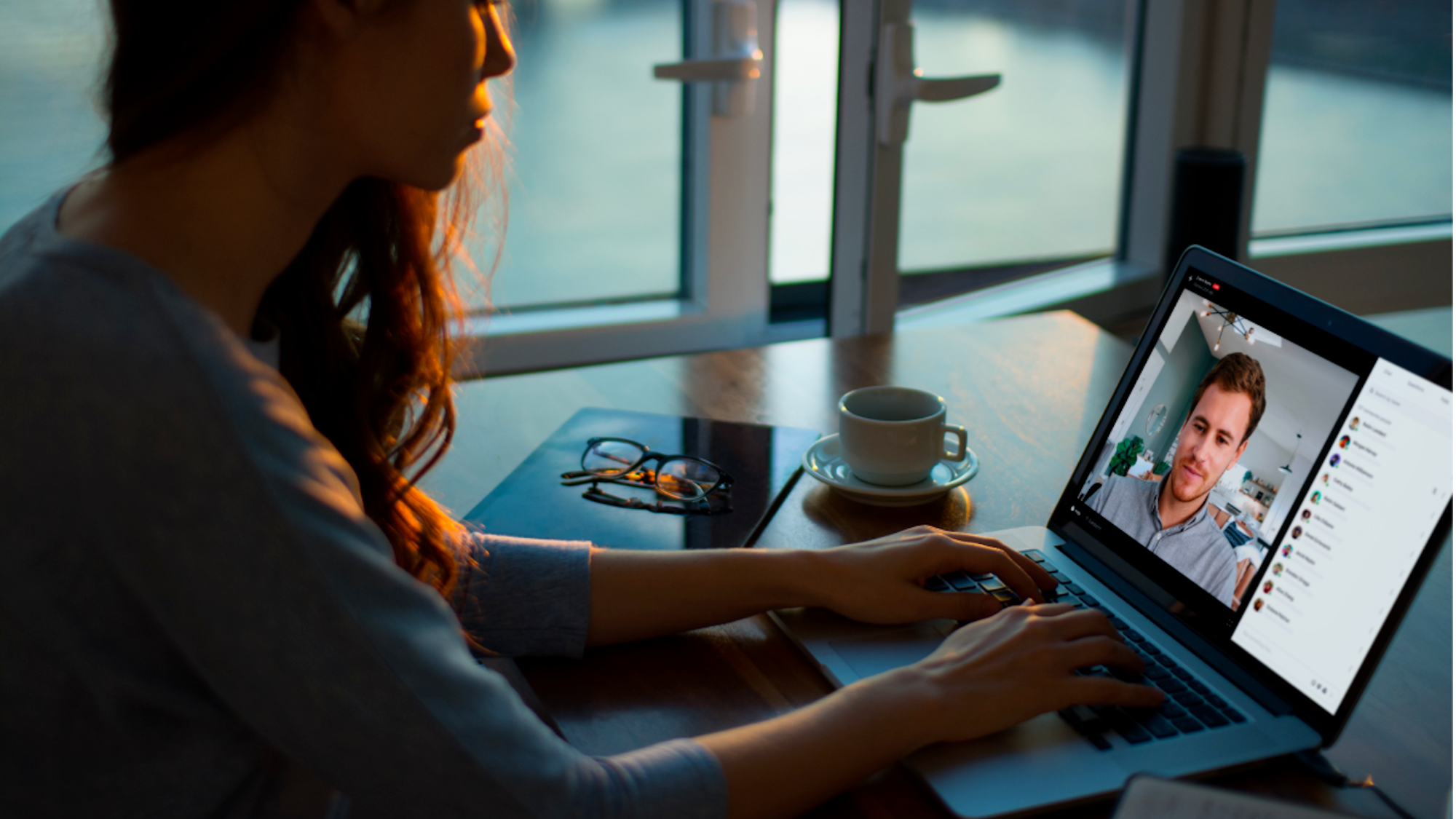 Woman using a laptop for virtual ice breakers