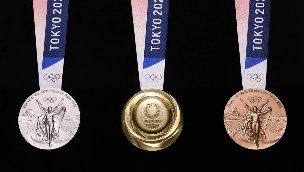 Gold, silver, and bronze medals made from recycled electronic devices for the 2020 Tokyo Olympics that took place during the pandemic.