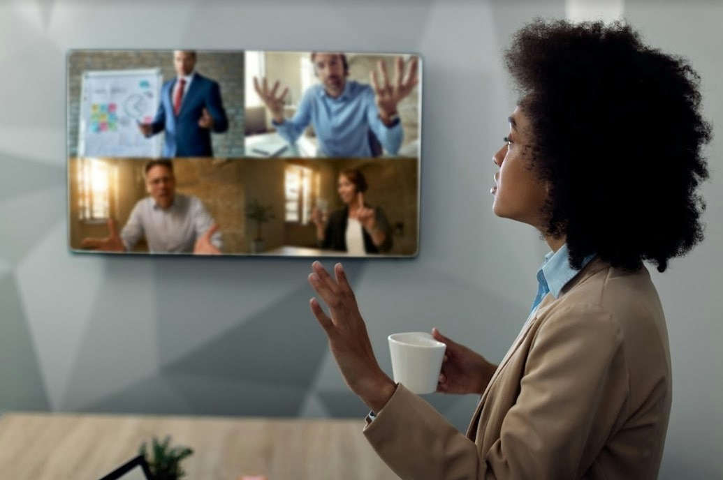 Businesswoman engaging in a panel discussion over video conference
