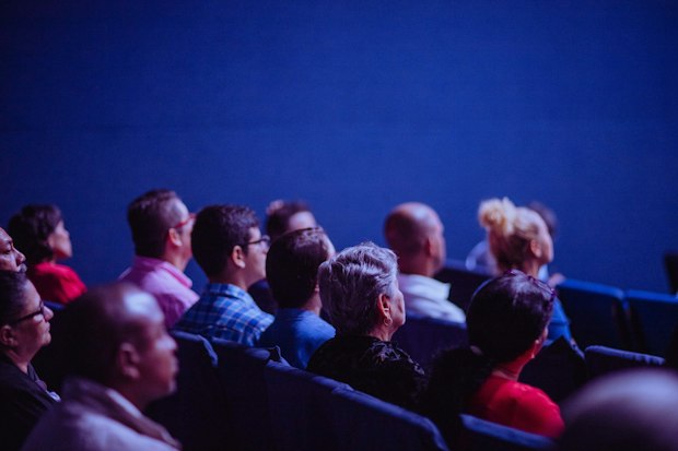 A picture of seminar attendees sitting in a venue