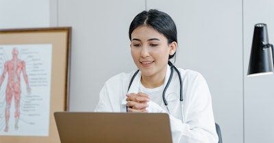 healthcare professional delivering a CME course