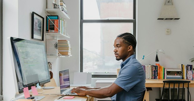 demand generation professional working at a computer