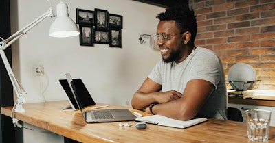 lead generation professional working at a laptop
