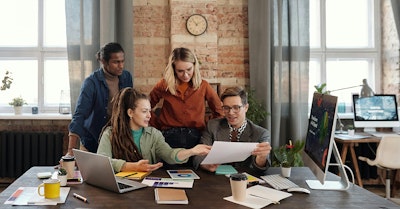 marketing and sales team collaborating on account-based marketing campaigns