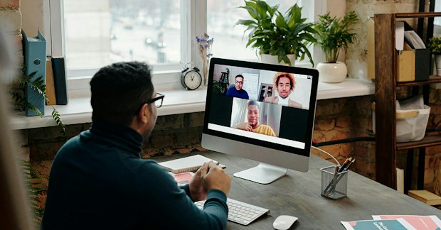 man attending a virtual medical conference