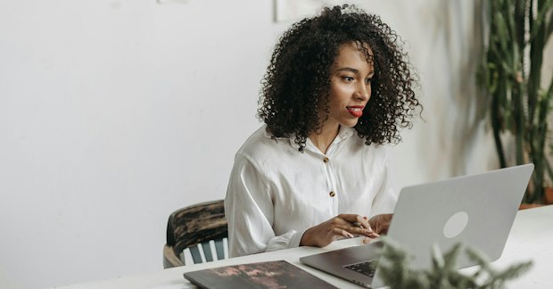 woman watching an accessible webinar